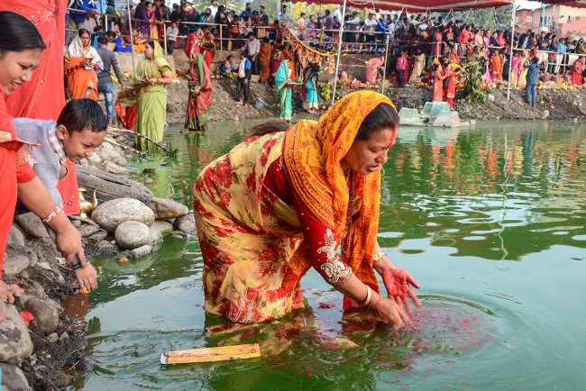 Making Offerings during the Chhath Puja Festival in Nepal
