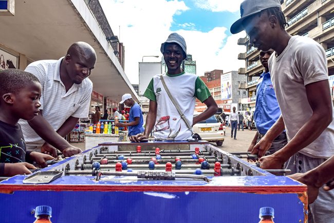 Zimbabweans Enjoy a Game of Table Football