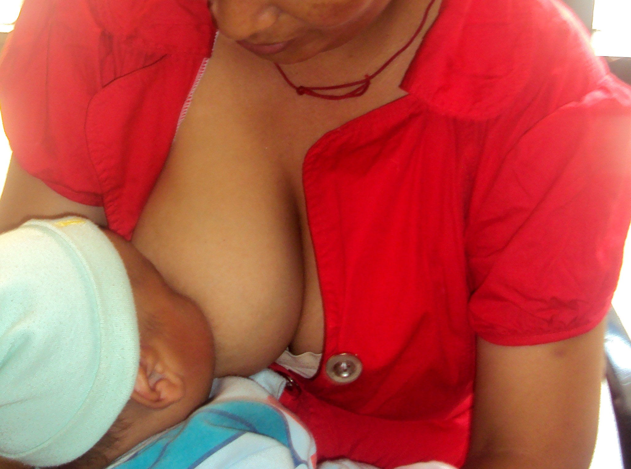 Working Mothers Strive to Breast-Feed, Provide Care in Nepal